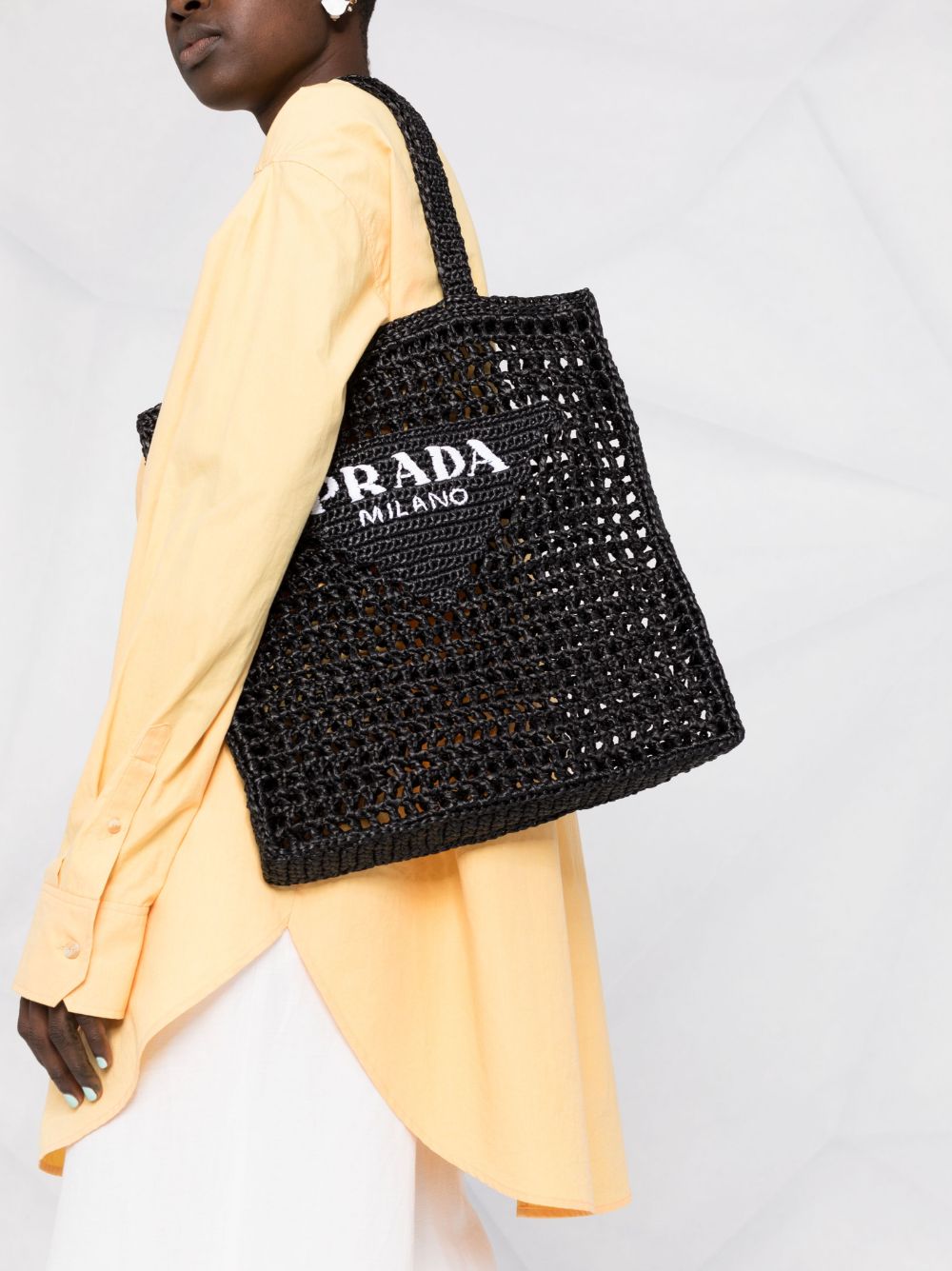Pra*a logo-strap cross body bag